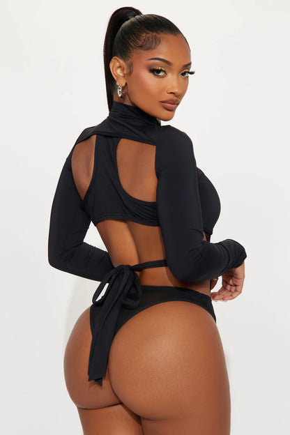 TRIGGERED LONG SLEEVE CUT OUT